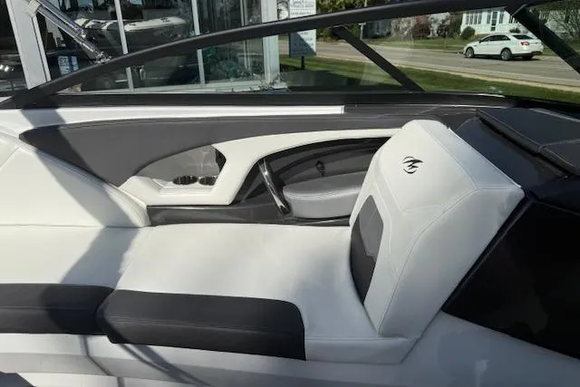 Slide: The Image of Dashboard controls of a 2018 Monterey 224FS boat, featuring gauges and switches. - 11