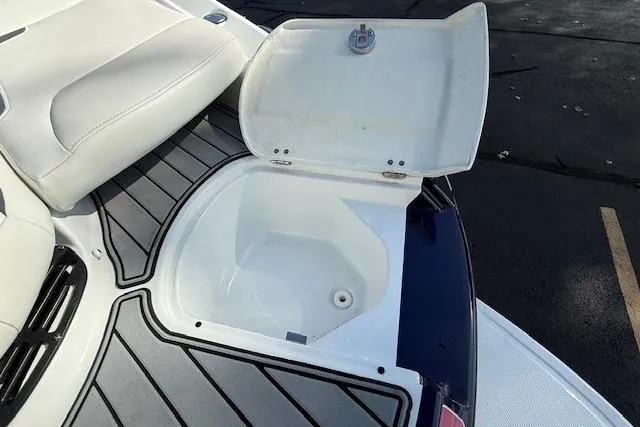 Slide: The Image of Open storage compartment on 2018 Monterey 224FS boat deck. - 33