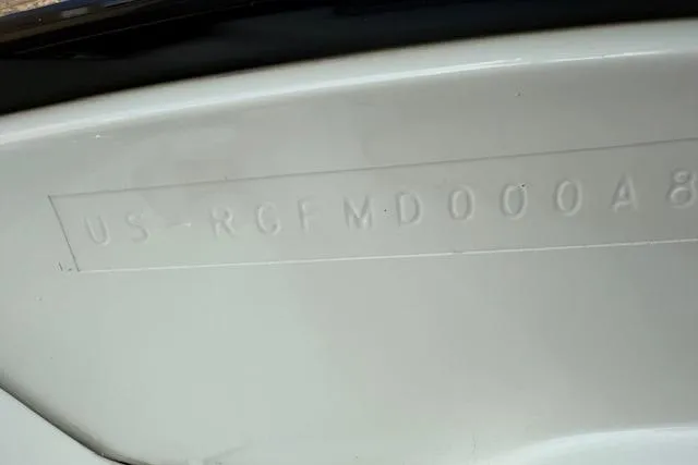 Slide: The Image of 2018 Monterey 224FS boat interior with white seating and modern dashboard. - 41