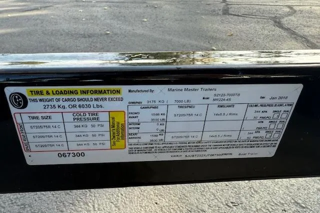 Slide: The Image of Tire and loading information label on a 2018 Monterey 224FS trailer. - 45