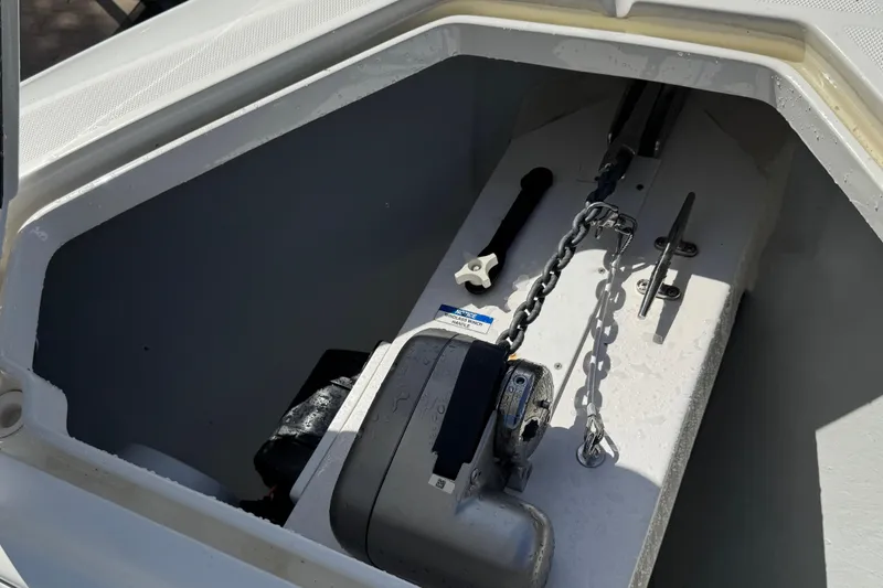 Slide: The Image of Anchor compartment of 2023 SeaVee 340Z boat with chain and winch system. - 24