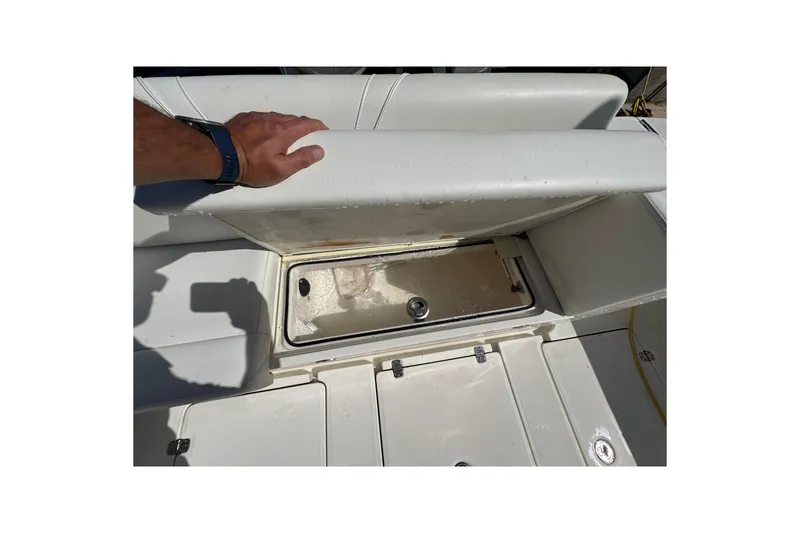 Slide: The Image of 2023 SeaVee 340Z boat storage compartment with open lid, showcasing interior details. - 27