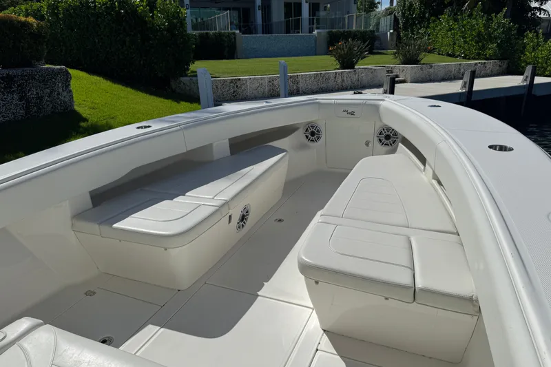 Slide: The Image of 2023 SeaVee 340Z boat interior with white seating and modern design. - 6