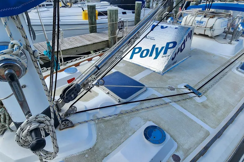 Slide: The Image of Deck of 1980 Nordic 44 sailboat with ropes and PolyP insulation. - 17