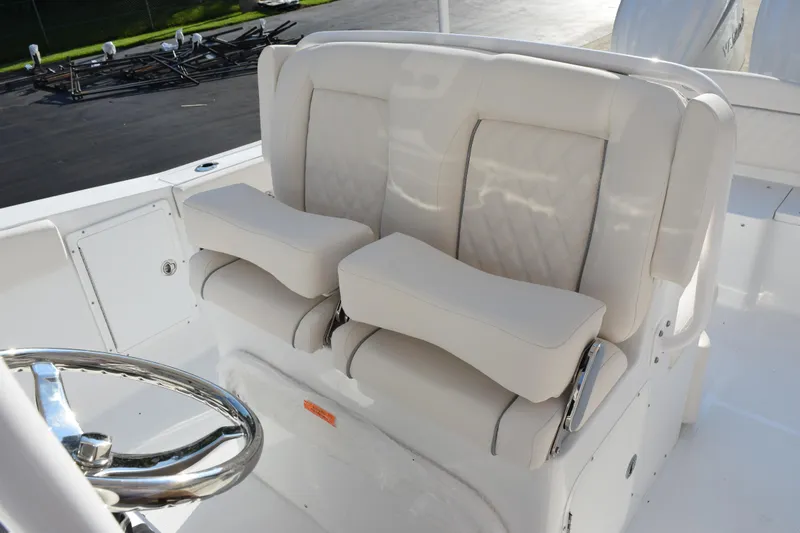 Slide: The Image of Luxurious seating on 2026 Sea Hunt Ultra 265 SE boat with elegant design. - 10