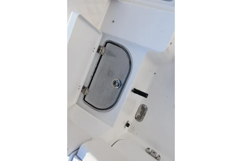Slide: The Image of Hatch detail of 2026 Sea Hunt Ultra 265 SE boat interior. - 21