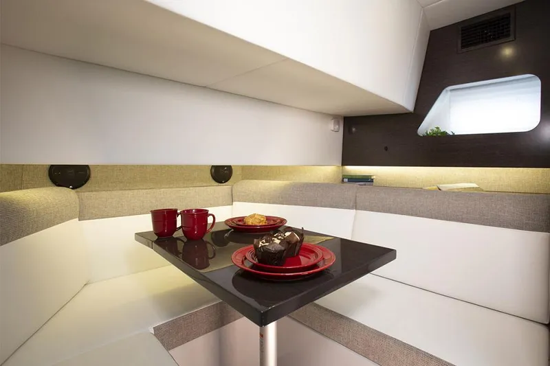 Slide: The Image of Manufacturer Provided Image: Interior dining area of 2022 Cruisers Yachts 38 GLS with modern seating and table. - 23