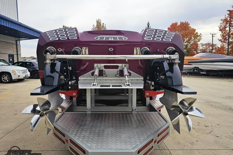 Slide: The Image of Rear view of a 2008 Eliminator 36 Daytona Coupe boat with dual propellers. - 39