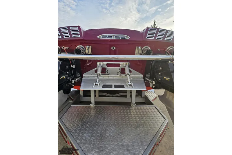 Slide: The Image of Rear view of a 2008 Eliminator 36 Daytona Coupe boat with dual engines. - 40