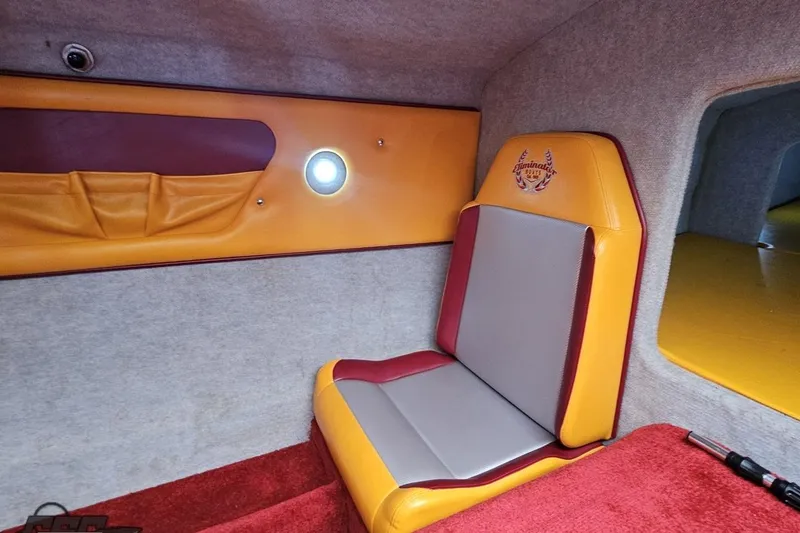 Slide: The Image of Interior of 2008 Eliminator 36 Daytona Coupe with custom yellow and red seating. - 82