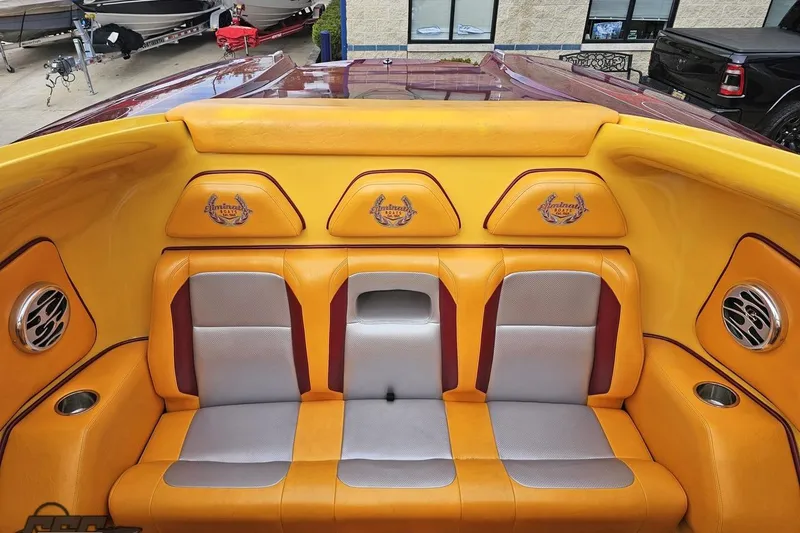 Slide: The Image of Luxurious interior of 2008 Eliminator 36 Daytona Coupe with vibrant yellow seating. - 90