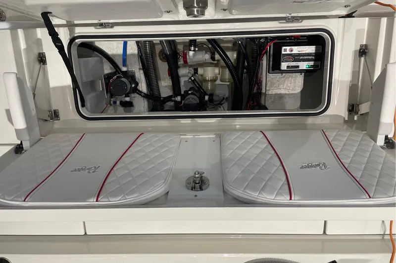 Slide: The Image of Interior view of a 2026 Ranger 2510 Bay boat's engine compartment. - 8