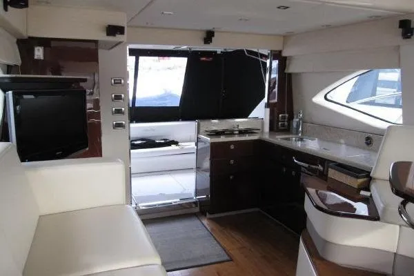 Slide: The Image of Luxurious interior of a 2008 Sea Ray 47 Sedan Bridge yacht with modern amenities. - 10