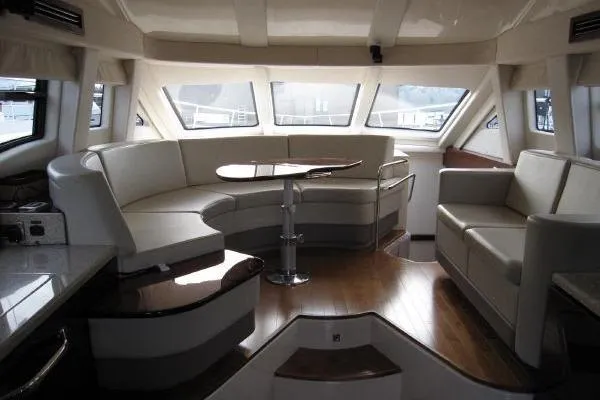 Slide: The Image of Luxurious interior of 2008 Sea Ray 47 Sedan Bridge yacht with elegant seating. - 8