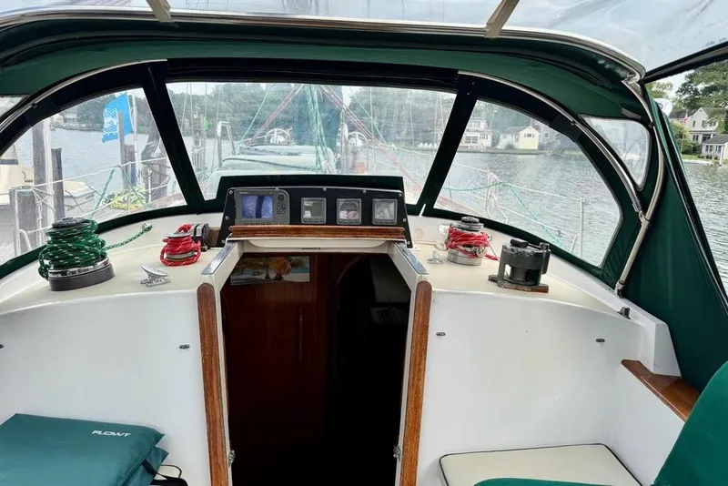 Slide: The Image of 1981 Bristol 45.5 Aft Cockpit sailboat interior with navigation instruments and winches. - 14