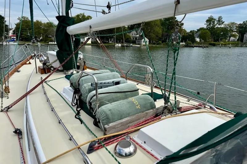 Slide: The Image of 1981 Bristol 45.5 Aft Cockpit sailboat on calm water, featuring deck and rigging. - 2