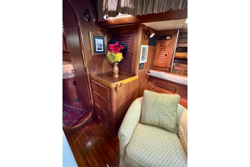 Slide: The Image of Interior of 1981 Bristol 45.5 Aft Cockpit yacht with cozy seating and wooden cabinetry. - 36