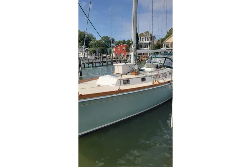 Slide: The Image of 1981 Bristol 45.5 Aft Cockpit sailboat docked in a marina, sunny day. - 48
