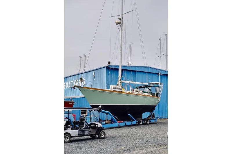 Slide: The Image of 1981 Bristol 45.5 Aft Cockpit sailboat on trailer at boatyard. - 49