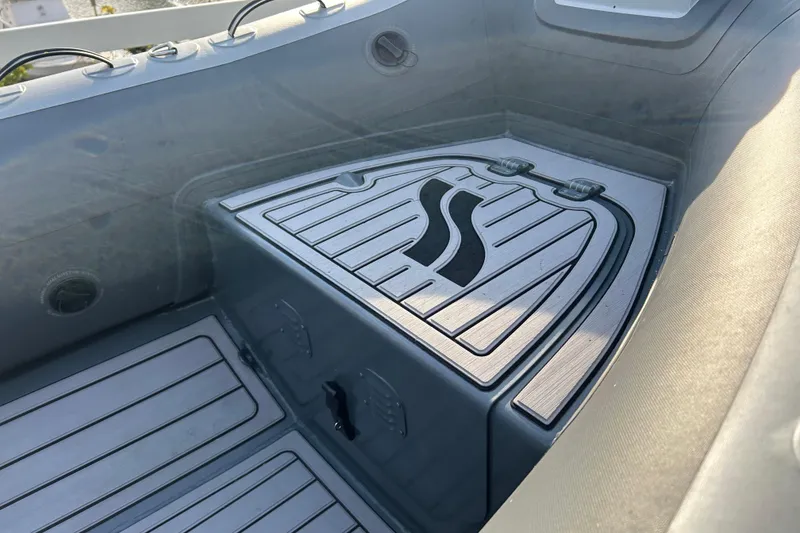 Slide: The Image of 2024 Highfield Classic 310 boat interior with sleek, modern flooring design. - 3