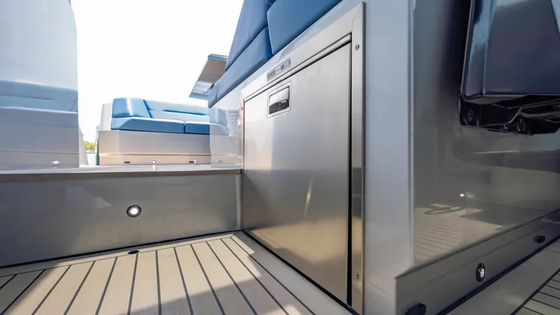Slide: The Image of 2023 Vanquish Yachts VQ45 interior with sleek design and modern seating. - 30