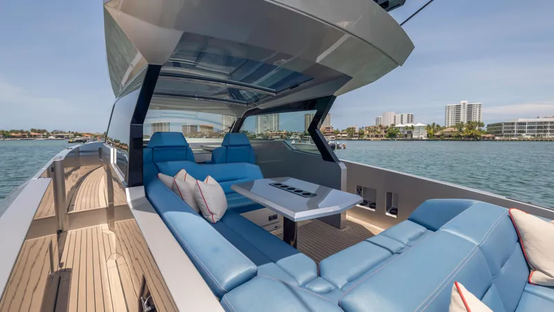 Slide: The Image of Luxurious 2023 Vanquish Yachts VQ45 with sleek design and spacious seating on open water. - 40