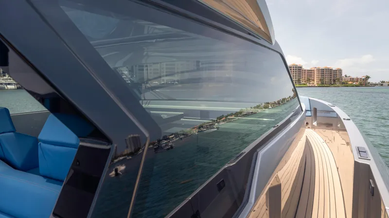 Slide: The Image of 2023 Vanquish Yachts VQ45 with sleek design and modern features on the water. - 46