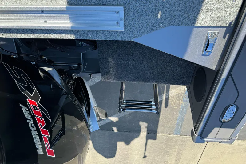 Slide: The Image of 2026 Lund 2075 Fisherman boat with Mercury Pro XS engine and boarding ladder. - 21