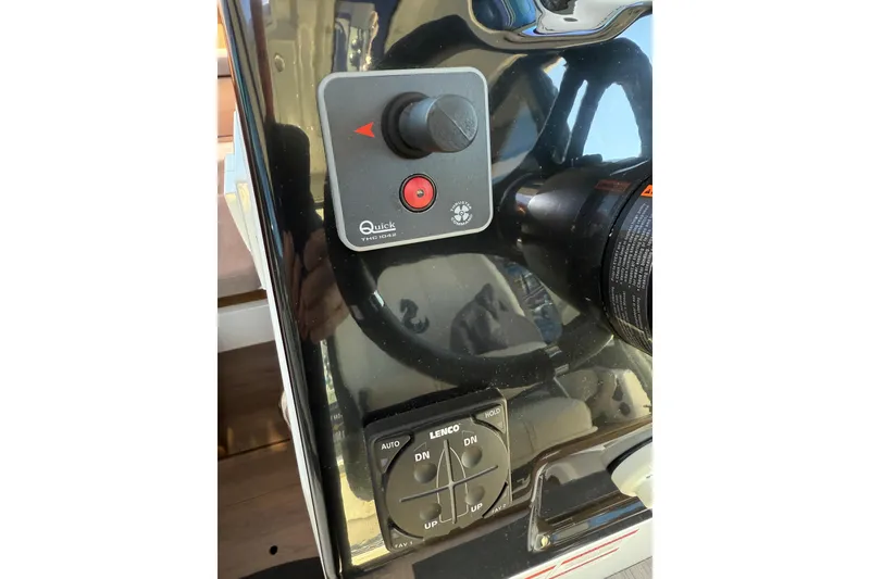 Slide: The Image of Control panel of a 2021 Beneteau Antares 9 boat, featuring navigation controls. - 10