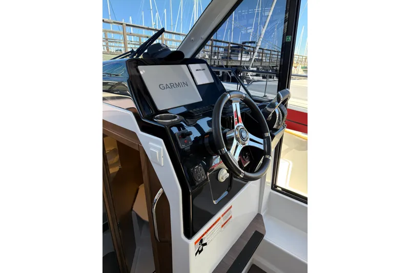 Slide: The Image of Helm of 2021 Beneteau Antares 9 with Garmin navigation system. - 6
