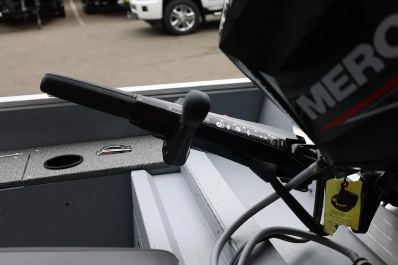 Slide: The Image of 2026 Lund 1400 Fury Tiller boat interior with Mercury engine control. - 9