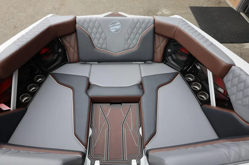 Slide: The Image of Luxurious interior of 2026 Tigé 22RZX boat with stylish seating and cup holders. - 20