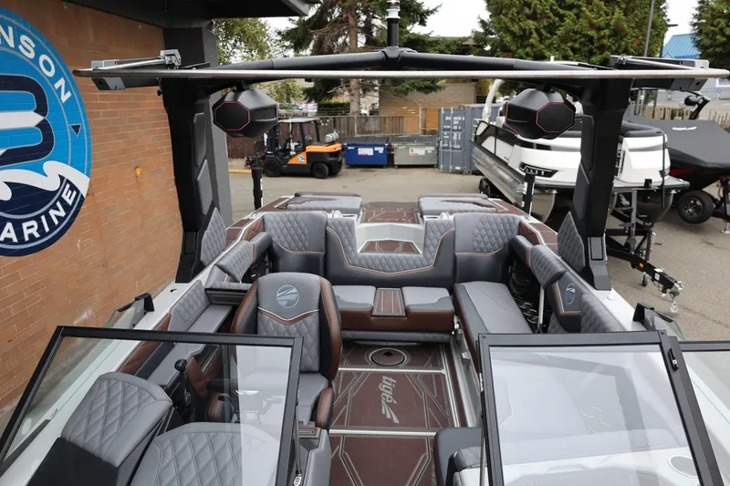 Slide: The Image of 2026 Tigé 22RZX boat interior with luxurious seating and modern design. - 24