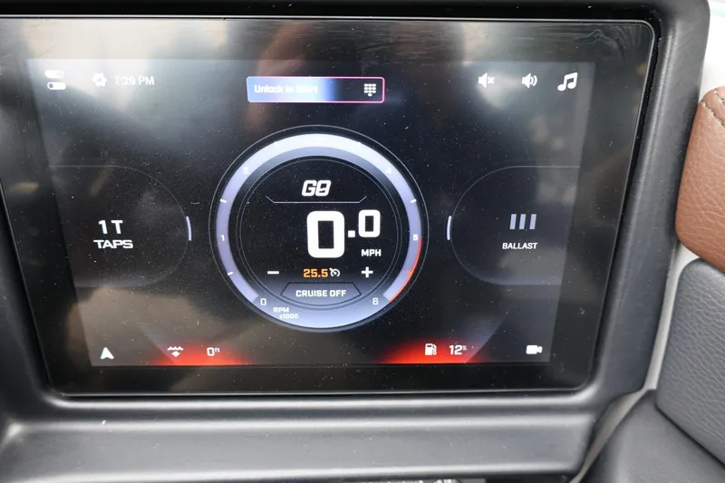 Slide: The Image of 2026 Tigé 22RZX dashboard display showing speed, ballast, and cruise control settings. - 29