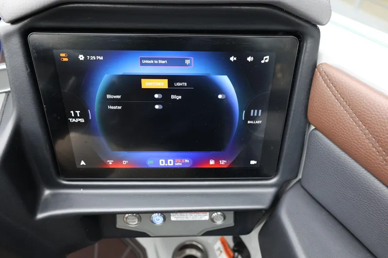 Slide: The Image of Touchscreen control panel of 2026 Tigé 22RZX boat, displaying switches and settings. - 31