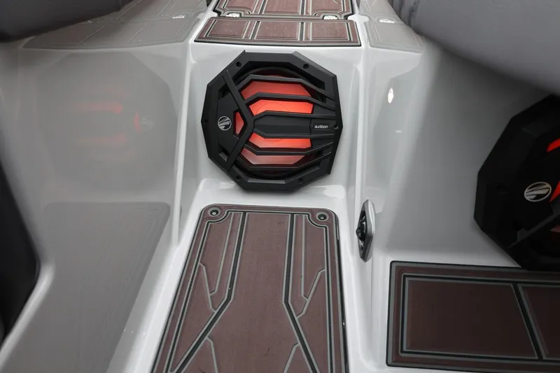 Slide: The Image of 2026 Tigé 22RZX boat interior with stylish speaker and wood-patterned flooring. - 44