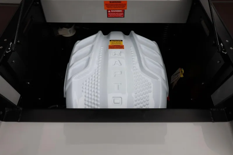 Slide: The Image of 2026 Tigé 22RZX engine compartment with Raptor engine cover. - 53