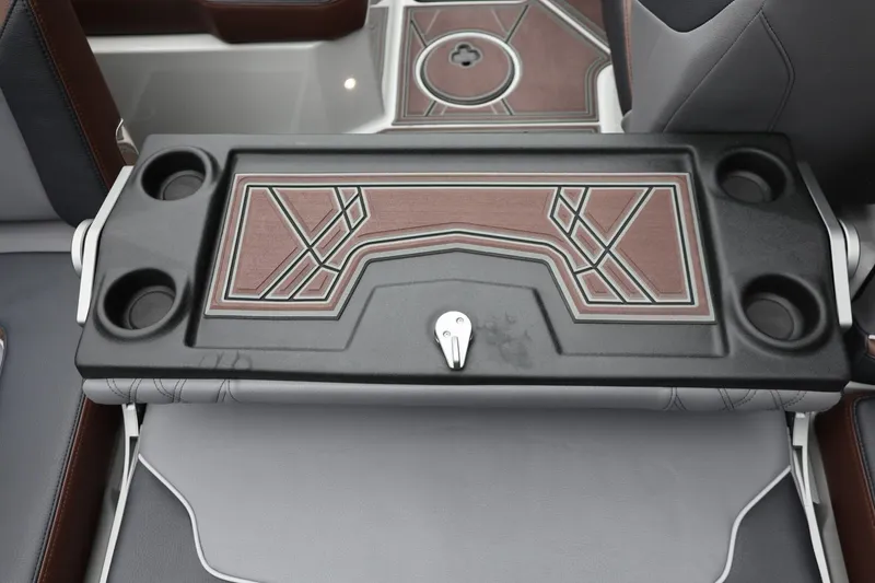 Slide: The Image of 2026 Tigé 22RZX boat interior with stylish cup holders and modern design. - 55