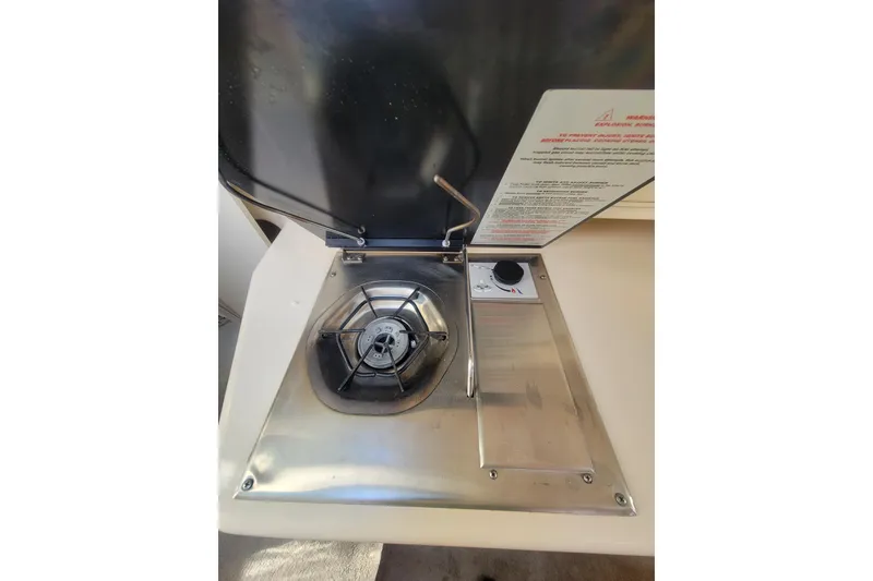 Slide: The Image of Stainless steel stove on 2000 Sea Ray 260 Sundancer boat. - 11