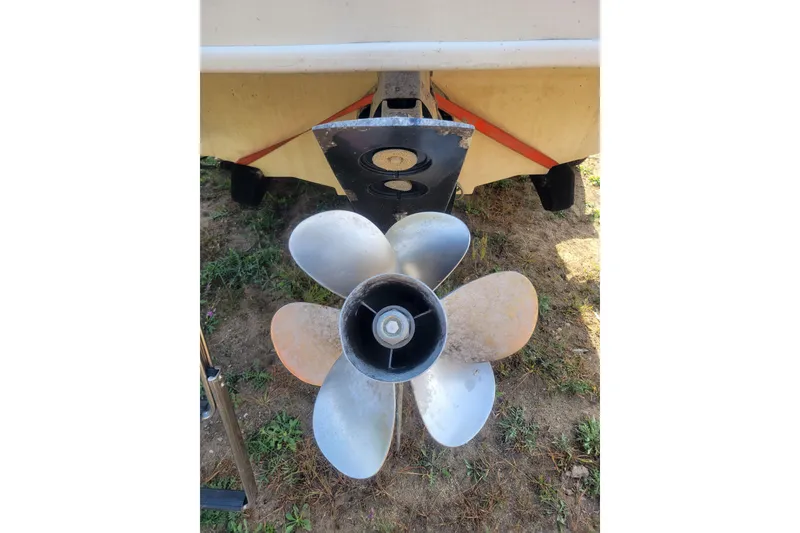 Slide: The Image of Propeller of 2000 Sea Ray 260 Sundancer boat on dry land. - 16