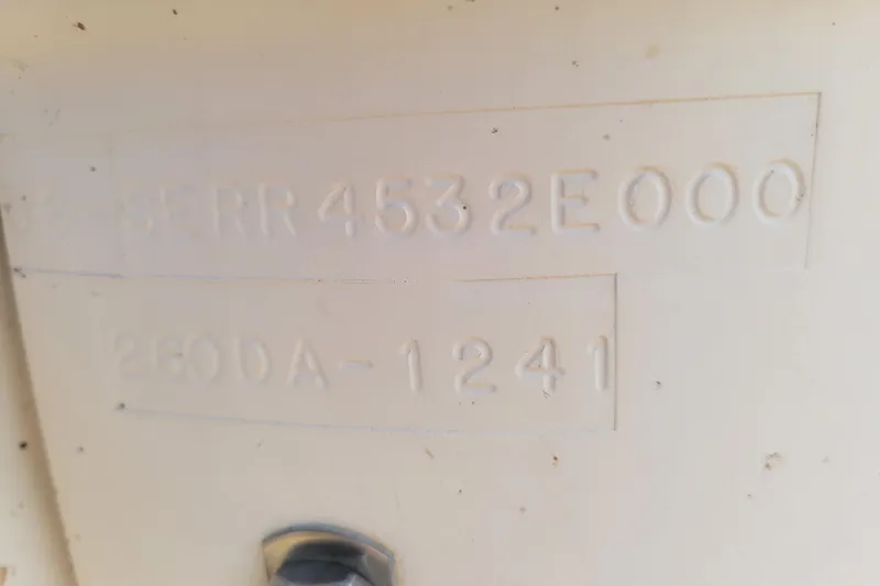 Slide: The Image of Hull identification number on 2000 Sea Ray 260 Sundancer boat. - 19