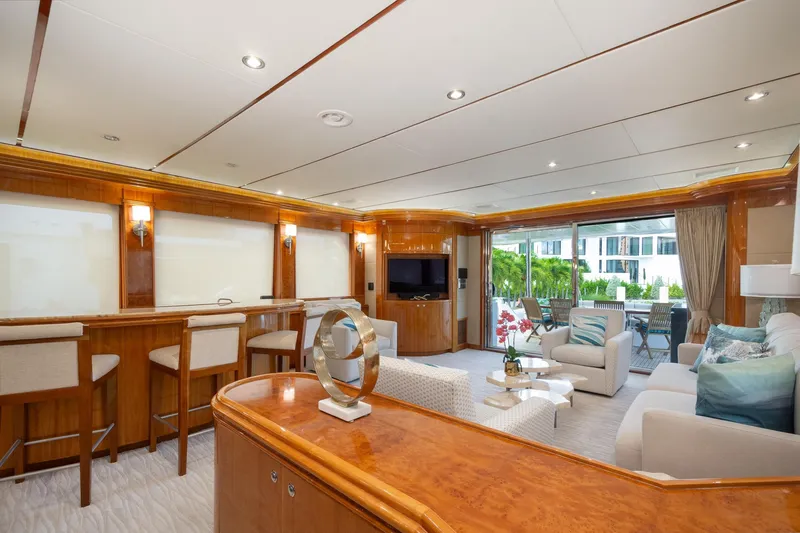 Slide: The Image of Luxurious interior of 2006 Hargrave Raised Pilothouse yacht with elegant seating and bar area. - 22