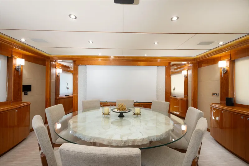 Slide: The Image of Luxurious dining area on 2006 Hargrave Raised Pilothouse yacht with elegant decor and lighting. - 24