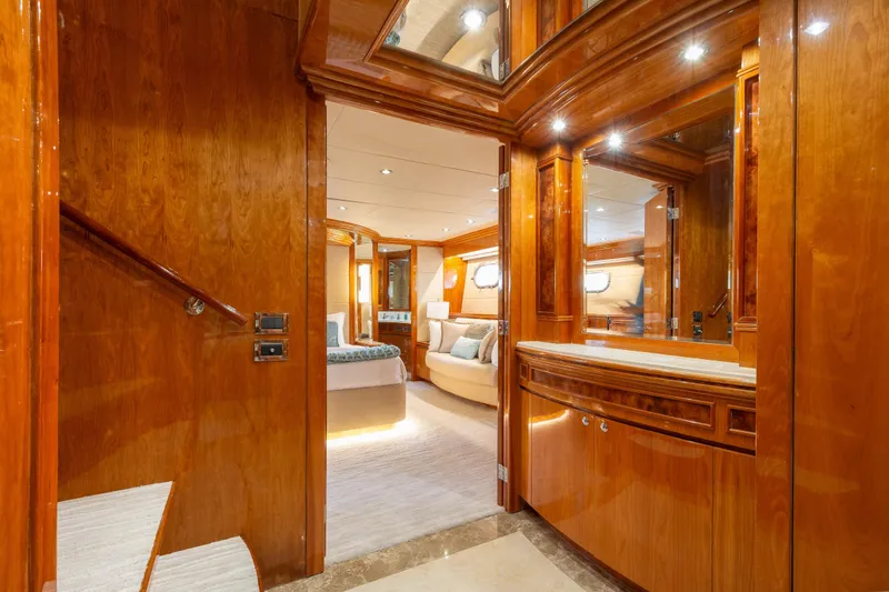 Slide: The Image of Luxurious 2006 Hargrave Raised Pilothouse yacht interior with elegant wood finishes and cozy bedroom. - 34