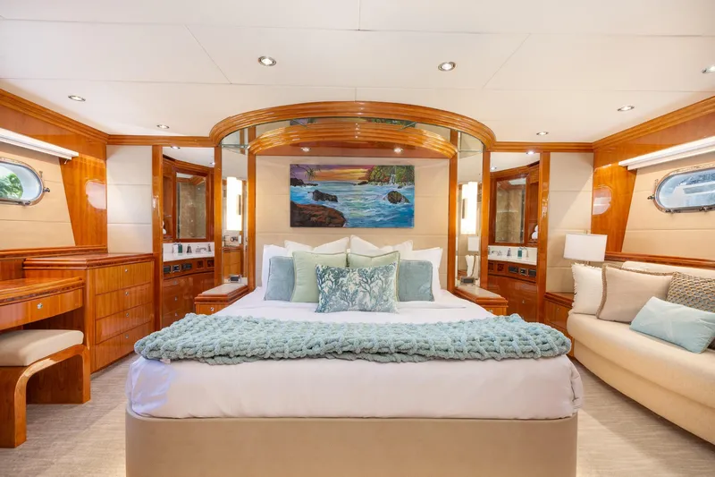Slide: The Image of Luxurious 2006 Hargrave Raised Pilothouse yacht bedroom with elegant wood finishes and plush bedding. - 35