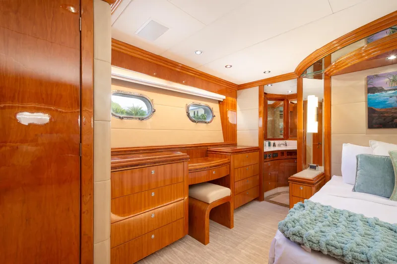 Slide: The Image of Luxurious 2006 Hargrave Raised Pilothouse yacht bedroom with elegant wood finishes and modern amenities. - 37