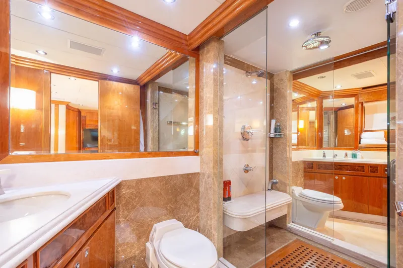 Slide: The Image of Luxurious bathroom in 2006 Hargrave Raised Pilothouse yacht with elegant wood and marble finishes. - 38