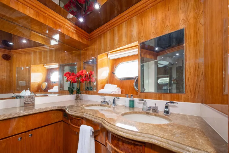 Slide: The Image of Luxurious bathroom in 2006 Hargrave Raised Pilothouse yacht with wood paneling and marble countertop. - 39