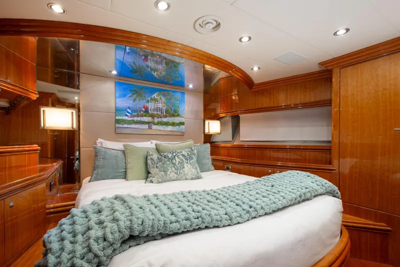 Slide: The Image of Luxurious bedroom interior on 2006 Hargrave Raised Pilothouse yacht with elegant wood finishes. - 41