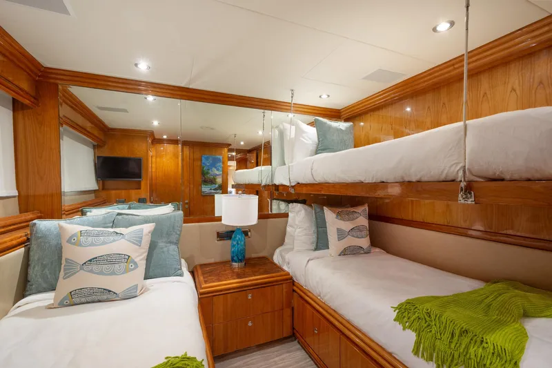 Slide: The Image of Luxurious 2006 Hargrave Raised Pilothouse yacht cabin with twin beds and elegant wood finish. - 44